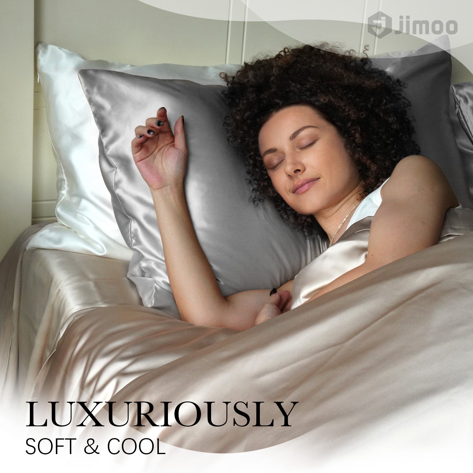 Woman sleeping peacefully on a grey silk pillowcase — luxuriously soft and cool.
