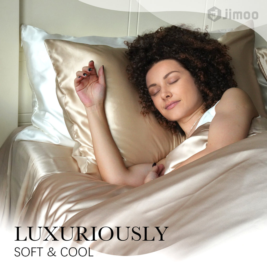 Woman sleeping peacefully on a pure white silk pillowcase — luxuriously soft and cool.